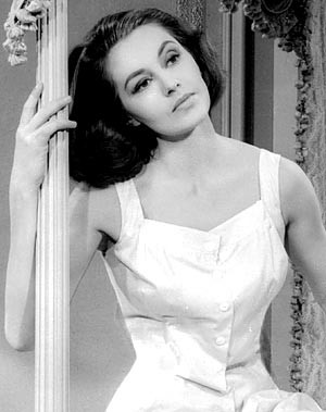 Cyd Charisse - holding pole Photo Print (8 x 10) - Item # DAP15698
