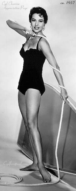 Cyd Charisse - holding rope Photo Print (8 x 10) - Item # DAP15938