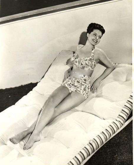 Cyd Charisse - lounging in bikini Photo Print (8 x 10) - Item # DAP15730