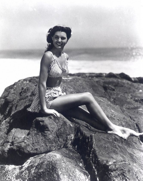 Cyd Charisse - sitting on rocks  Photo Print (8 x 10) - Item # DAP15901