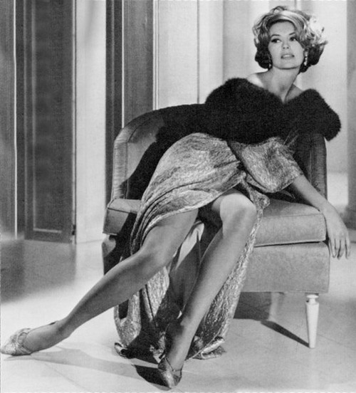 Cyd Charisse - slouching in chair black and white Photo Print (8 x 10) - Item # DAP15718