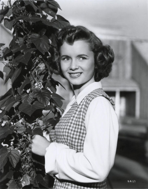 Debbie Reynolds- Standing next to bush Photo Print (8 x 10) - Item # DAP16390