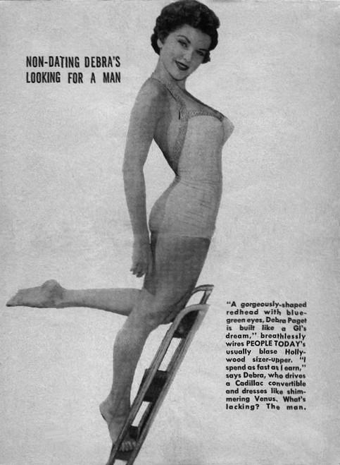 Debra Paget- Climbing ladder in one piece Photo Print (8 x 10) - Item # DAP16601