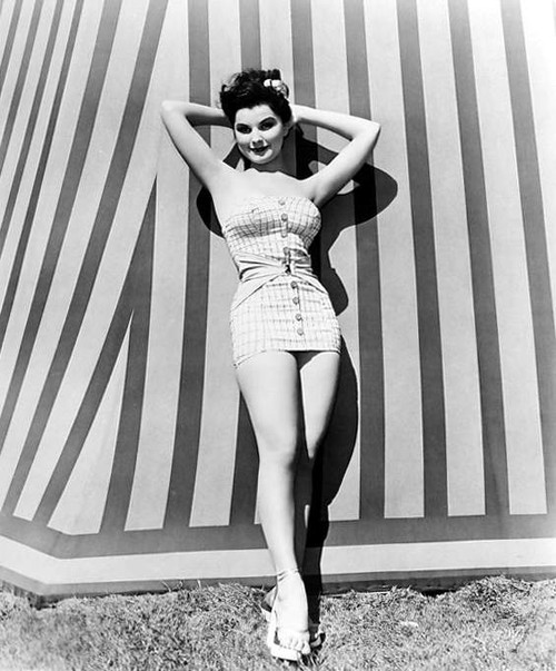 Debra Paget- Leaning against striped wall Photo Print (8 x 10) - Item # DAP16581