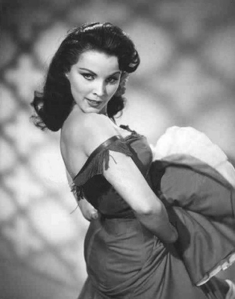 Debra Paget- Picking up skirt Photo Print (8 x 10) - Item # DAP16603