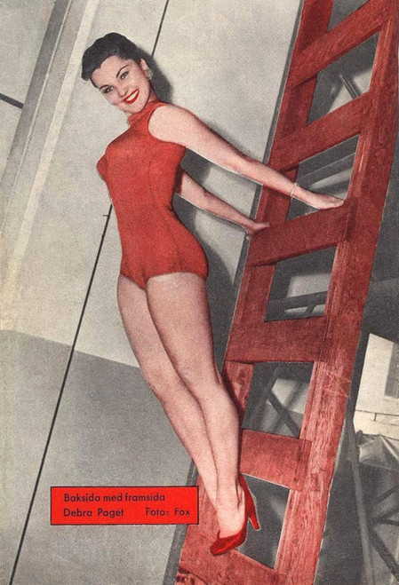 Debra Paget- Red one piece posed on red ladder Photo Print (8 x 10) - Item # DAP16650