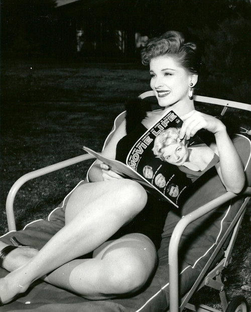 Debra Paget- Sitting with magazine Photo Print (8 x 10) - Item # DAP16763