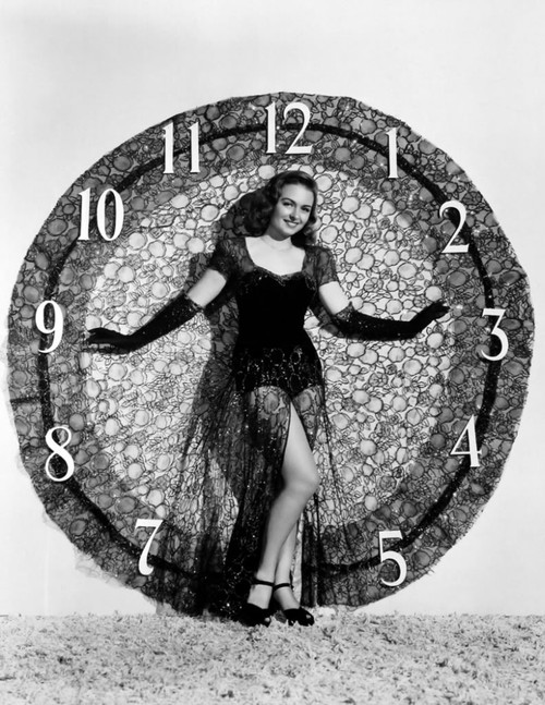 Donna Reed - Clock Pose Photo Print (8 x 10) - Item # DAP17052