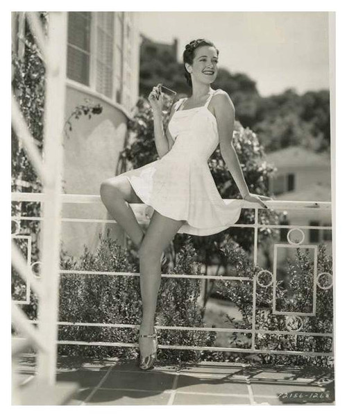 Dorothy Lamour - On Banister Photo Print (8 x 10) - Item # DAP17254