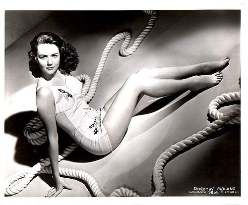 Dorothy Malone - Sitting on Floor With Rope Photo Print (10 x 8) - Item # DAP17334