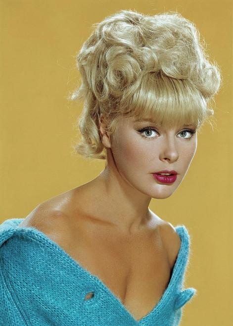 Elke Sommer - Headshot with Yellow Background wearing Blue Top Photo Print (8 x 10) - Item # DAP17908