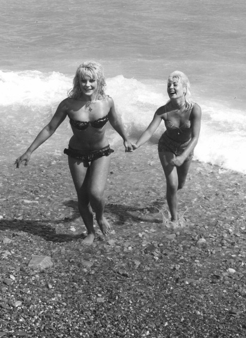 Elke Sommer - Holding hand on the Beach Photo Print (8 x 10) - Item # DAP18059