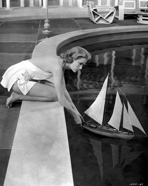 Grace Kelly - Pushing Toy Boat in Pool Photo Print (8 x 10) - Item # DAP18219