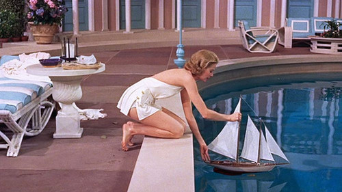 Grace Kelly - Pushing Toy Boat in Pool Color Photo Print (10 x 8) - Item # DAP18340