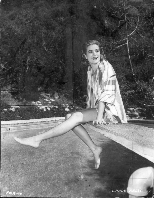 Grace Kelly - Sitting Leg Out on Diving Board Photo Print (8 x 10) - Item # DAP18287