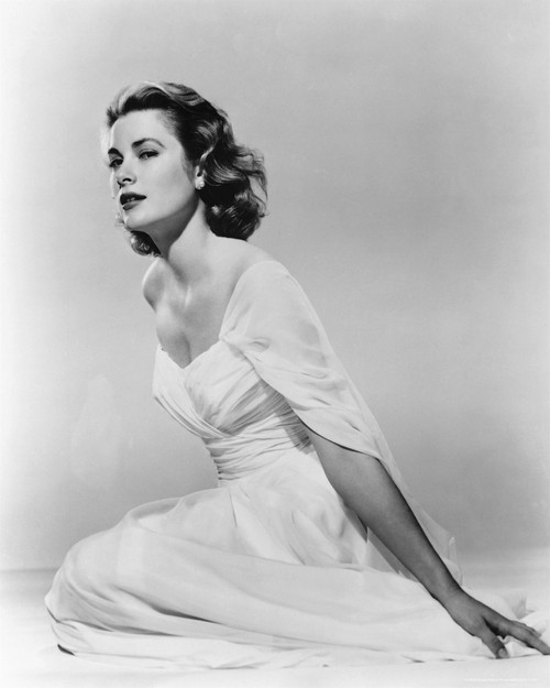 Grace Kelly - Sitting Sideways Holding Foot in White Dress Photo Print (8 x 10) - Item # DAP18224