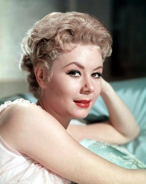 Mitzi Gaynor - Laying on Blue Pillow Photo Print (8 x 10) - Item # DAP19122