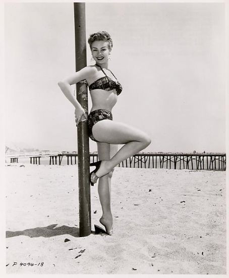 Mitzi Gaynor - Leaning Against Pole Photo Print (8 x 10) - Item # DAP18917
