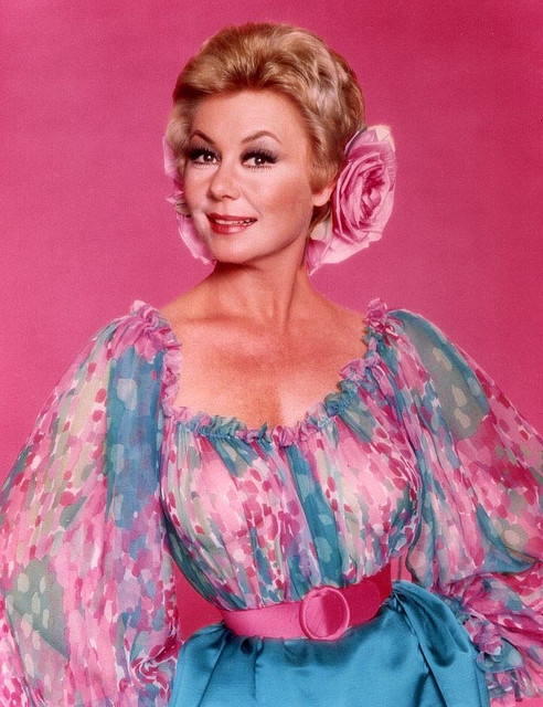 Mitzi Gaynor - Pink Flower in Hair Photo Print (8 x 10) - Item # DAP19132