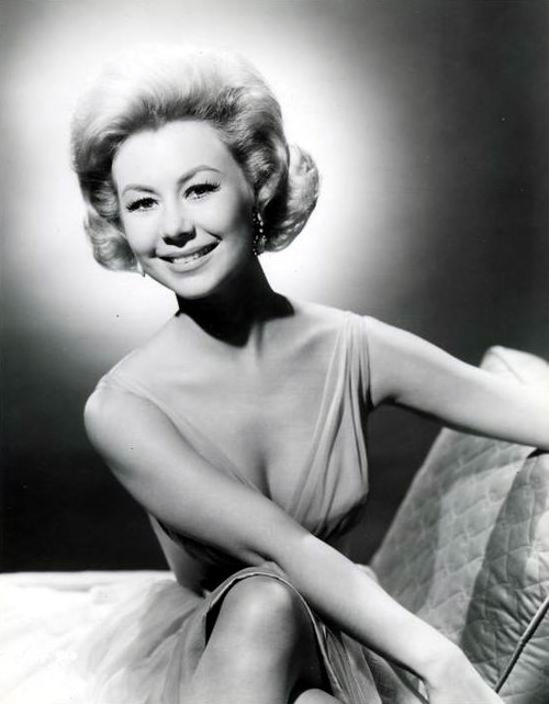 Mitzi Gaynor - Sitting on Couch Photo Print (8 x 10) - Item # DAP18987