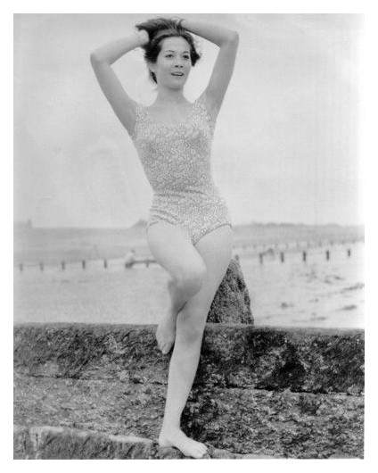 Nancy Kwan - Foot on Ledge Photo Print (8 x 10) - Item # DAP19572