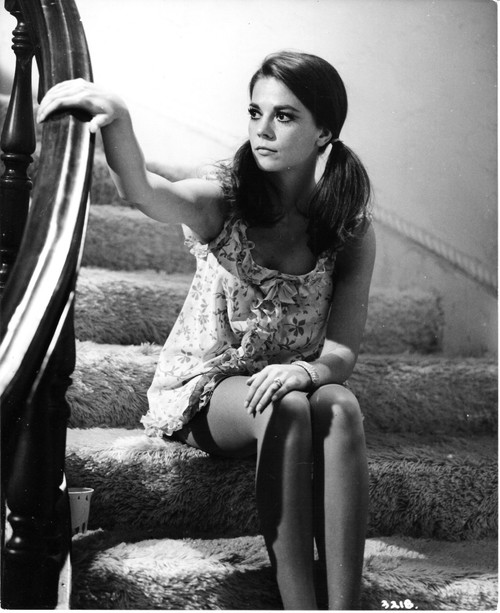 Natalie Wood - Sitting on Stairs Holding Bannister Photo Print (8 x 10) - Item # DAP110051