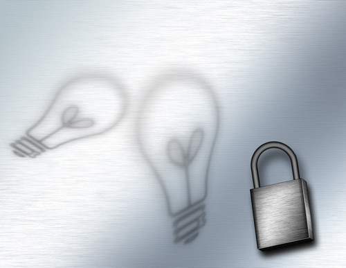 Protect Idea. Light bulbs and iron pad-lock Poster Print by Bruce Rolff/Stocktrek Images - Item # VARPSTRFF201049S