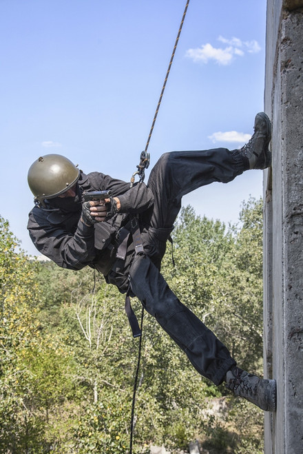 Spec ops soldier in face mask during rope exercises with weapons. Poster Print by Oleg Zabielin/Stocktrek Images (11 x 1 - Item # VARPSTZAB100343M