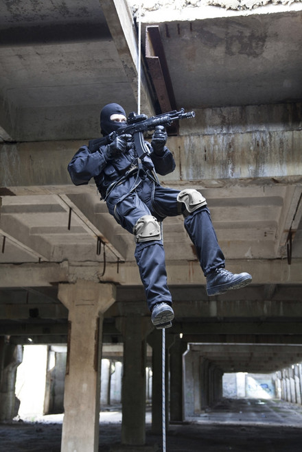 Special forces operator during assault rappelling with weapons. Poster Print by Oleg Zabielin/Stocktrek Images - Item # VARPSTZAB100878M