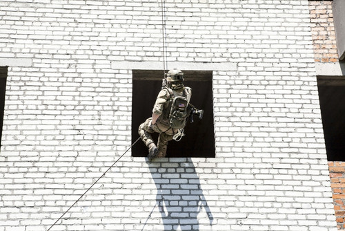 Soldier during assault rappelling exercises with weapons. Poster Print by Oleg Zabielin/Stocktrek Images - Item # VARPSTZAB100964M