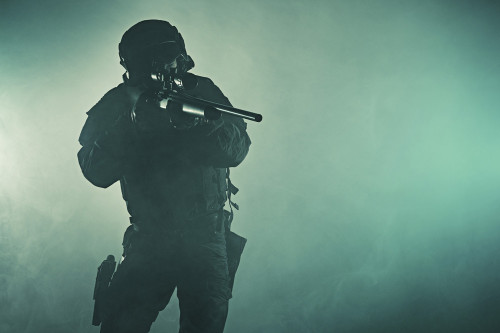 Studio shot of SWAT police operator with sniper rifle. Fire smoke screen background. Poster Print by Oleg Zabielin/Stock - Item # VARPSTZAB101095M