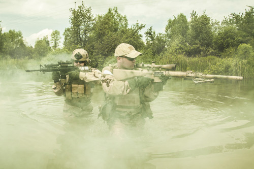 Navy SEALs crossing the river with weapons. Poster Print by Oleg Zabielin/Stocktrek Images - Item # VARPSTZAB101196M