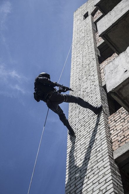 Spec ops police officer SWAT during assault operation. Poster Print by Oleg Zabielin/Stocktrek Images - Item # VARPSTZAB101245M Spec ops police officer SWAT during assault operation. Poster Print by Oleg Zabielin/Stocktrek Images - Item # VARPSTZAB101245M