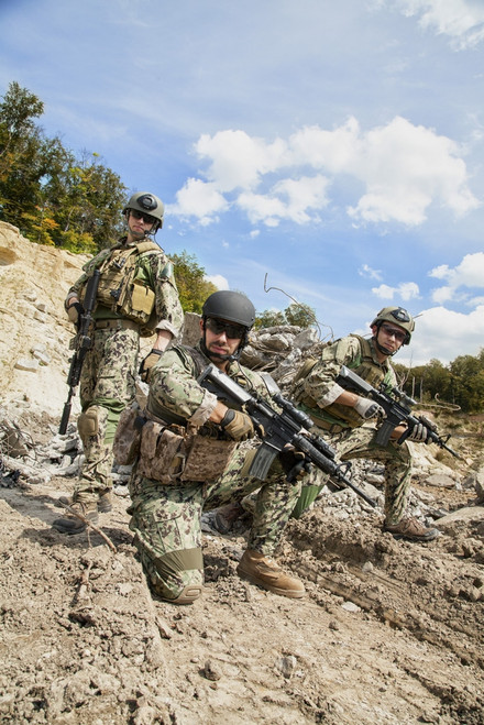 Members of Navy SEAL Team with weapons in action. Poster Print by Oleg Zabielin/Stocktrek Images - Item # VARPSTZAB101343M