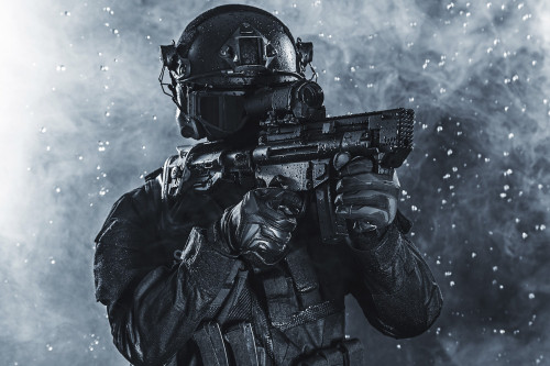 Spec ops police officer SWAT in the rain. Poster Print by Oleg Zabielin/Stocktrek Images - Item # VARPSTZAB101499M