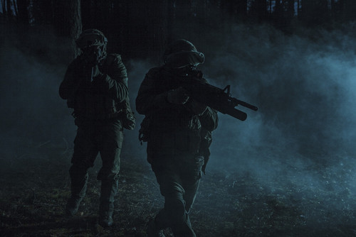 Pair of soldiers moving in stealth on a dark, gloomy night amongst the smoke. Poster Print by Oleg Zabielin/Stocktrek Im - Item # VARPSTZAB102429M