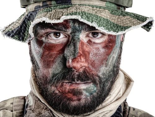 U.S. Special Forces soldier with camouflage face paint Solid-Faced Canvas  Print