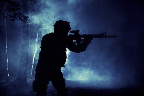 Black silhouette of soldier in the smoke during battle. Poster Print by Oleg Zabielin/Stocktrek Images - Item # VARPSTZAB103079M