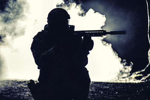 Black silhouette of soldier in the smoke during battle. Poster Print by Oleg Zabielin/Stocktrek Images - Item # VARPSTZAB103082M