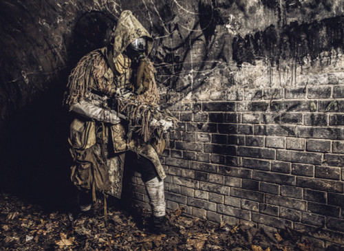 Post apocalyptic creature dressed in rags and gas mask, hiding in dungeon. Poster Print by Oleg Zabielin/Stocktrek Image - Item # VARPSTZAB103247M