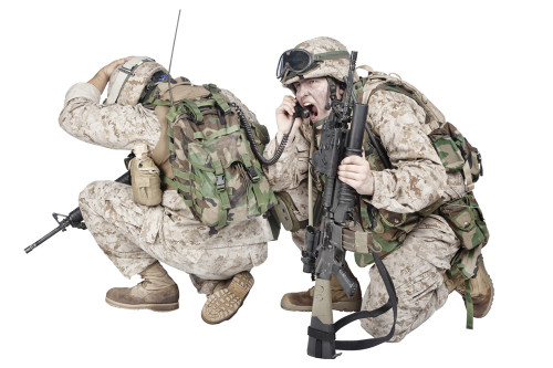 Soldiers crouching to ground talking on radio while under enemy fire. Poster Print by Oleg Zabielin/Stocktrek Images (17 - Item # VARPSTZAB103452M