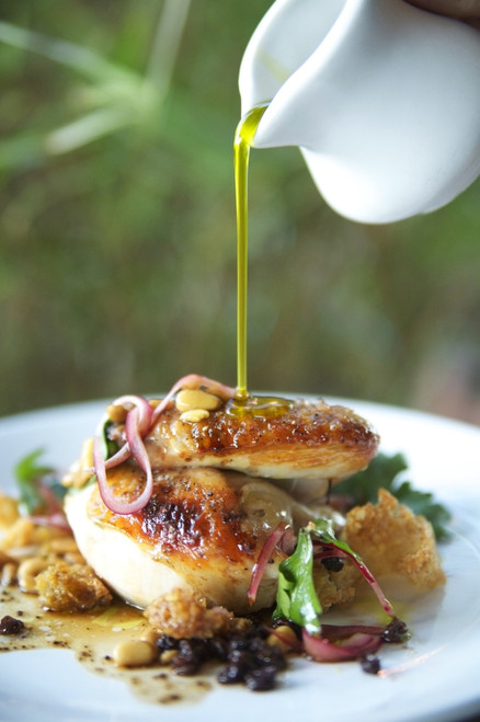 Hawaii, Olive Oil Being Poured Over Delicious Chicken Dish. Poster Print by Kicka Witte / Design Pics - Item # VARDPI1967167