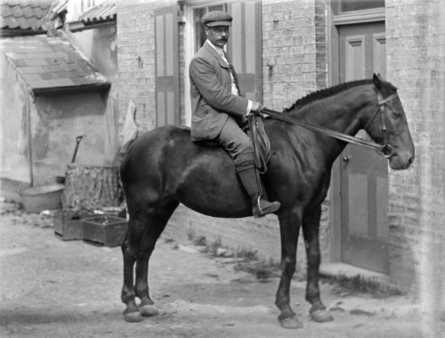Magic lantern slide Glass negative . Man on horse outside terraced house Poster Print by John Short / Design Pics - Item # VARDPI12513254