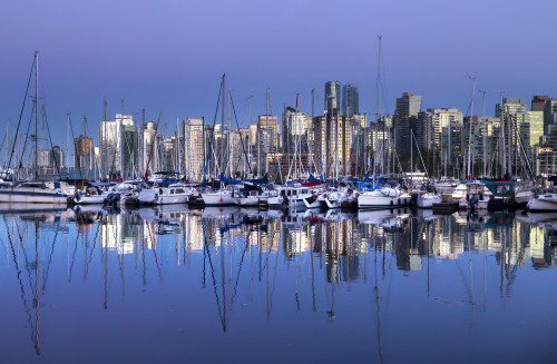 Skyline and harbour of Vancouver at twilight with reflections in the water; Vancouver, British Columbia, Canada Poster Print by Lorna Rande / Design Pics - Item # VARDPI12509791