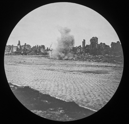 Magic lantern slide  WW1, 1914-1918, World war one images. A bomb exploding in a town virtually destroyed by war. Poster Print by John Short / Design Pics - Item # VARDPI12512069