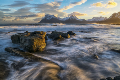 Sunset over the mountains of the Strandir Coast, Iceland as the surf pounds the shoreline; West Fjords, Iceland Poster Print by Robert Postma / Design Pics - Item # VARDPI12530957