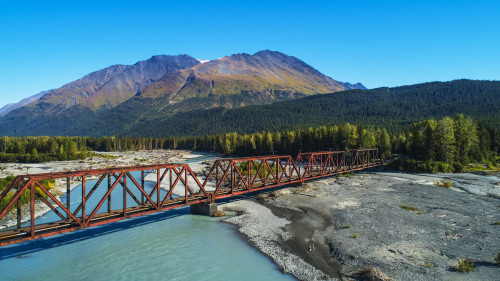 An aerial scenic of the Alaskan Railroad trestle crossing the Snow River on a sunny summer day in South-central Alaska; Alaska, United States of America Poster Print by Michael Jones / Design Pics - Item # VARDPI12546650