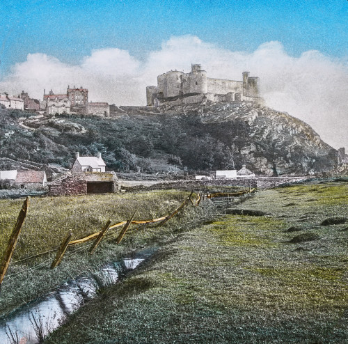 Magic Lantern slide circa 1900 hand coloured created 1887 A tour North Wales 39Harlech Castle Meadows This fine Castle is remains a once important fortress situated elevated rock about half-a-mile sea We are once struck beauty its situation strength