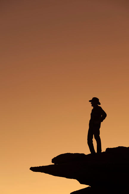 Man standing on rock surveying the view (MR) Poster Print by Brenda Tharp (18 x 24) # US45BTH0029