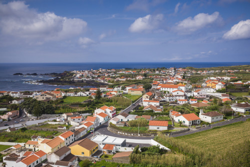 Portugal, Azores, Sao Miguel Island, Mosteiros. Elevated town view Poster Print by Walter Bibikow - Item # VARPDDEU23WBI1587